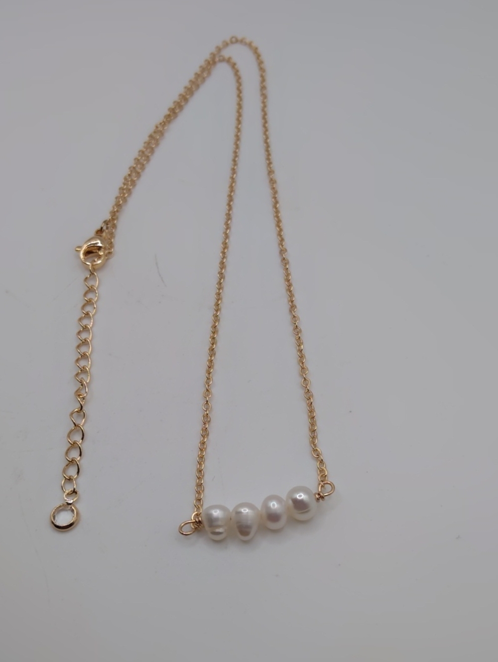 Freshwater Pearl on a Gold Tone Chain